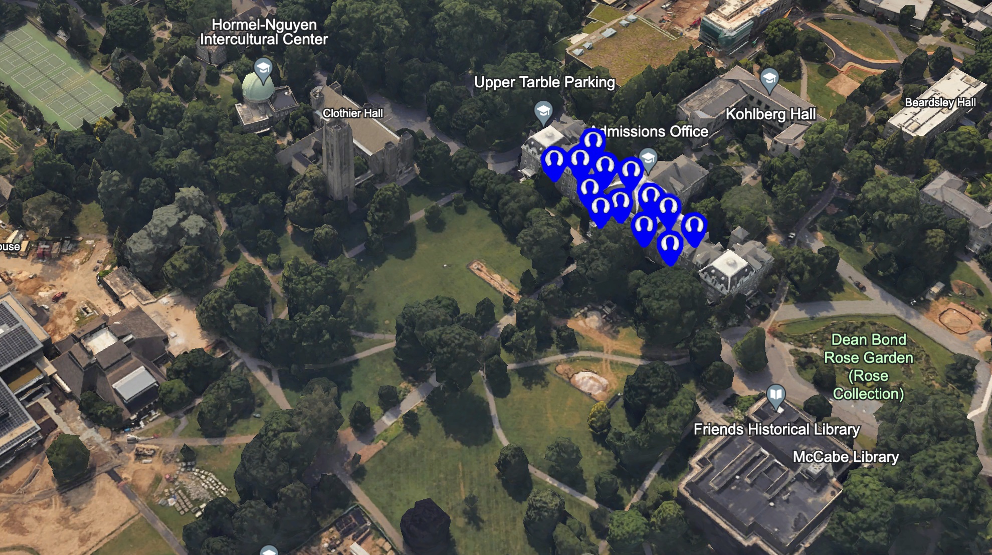 3D satellite photo from Google Earth of Swarthmore College's Parrish Hall and surroundings. Above Parrish Hall are the icons from Kendrick Lamar's "Not Like Us" single cover, changed to blue and white to represent the complicity of the Swarthmore College administration in Israel's bombing of Palestine.